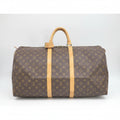 "Authentic Louis Vuitton Monogram Keepall 55 travel bag, brown monogram canvas, preloved grade B, front view"