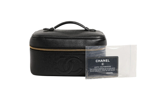 Chanel Black and gold makeup bag Chanel