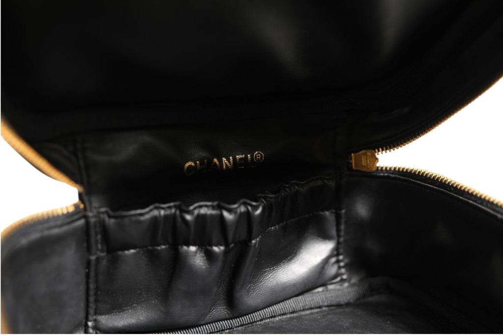 Chanel Black and gold makeup bag Chanel